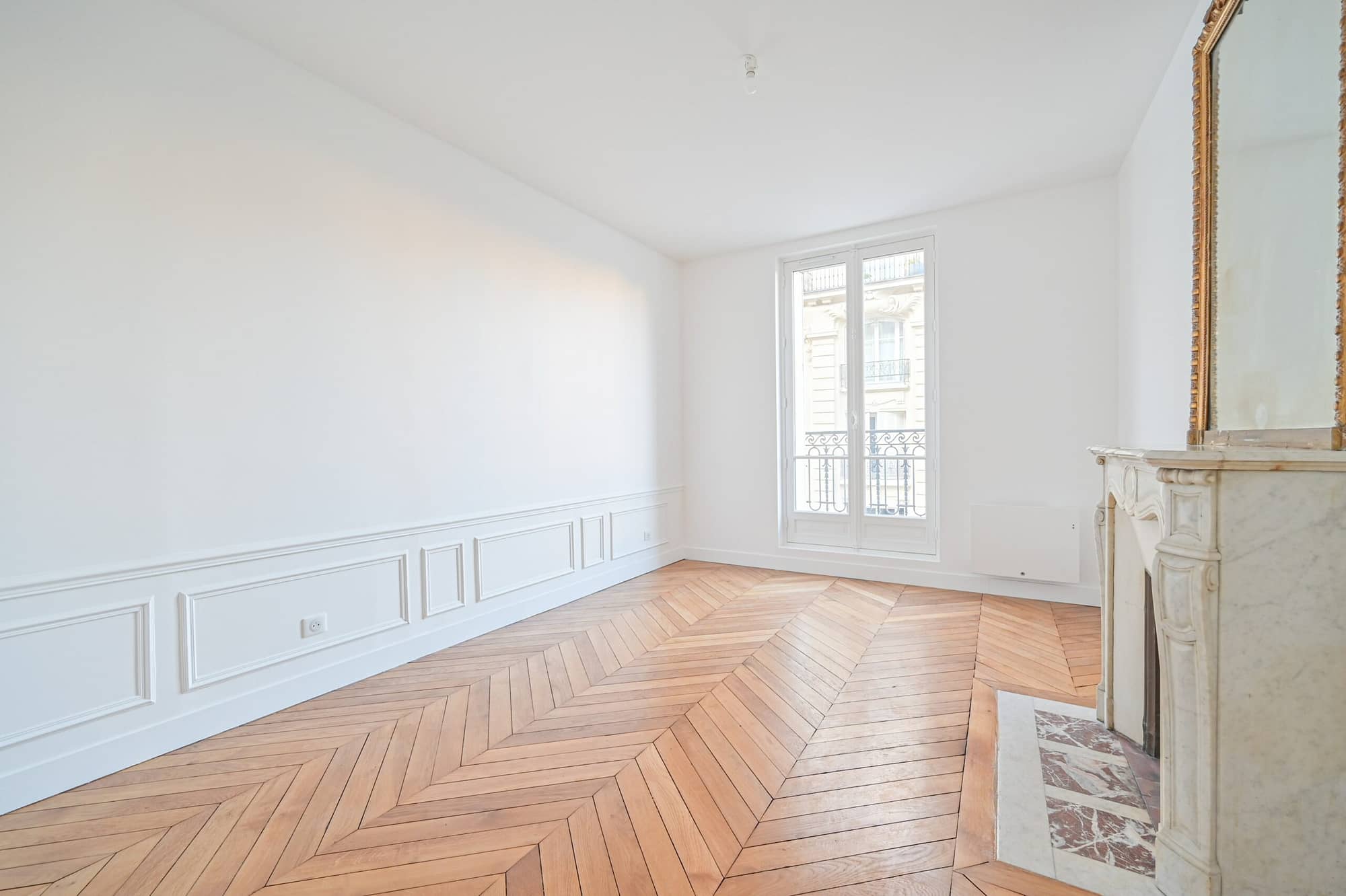 Séjour avec cheminée d'un appartement à Paris 15