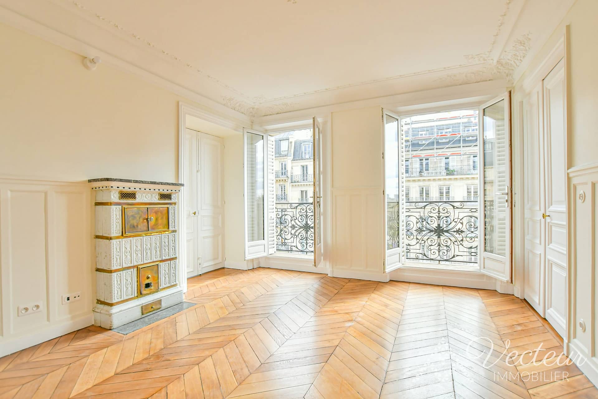 Chambre avec 2 fenêtres d'un appartement à Paris 5